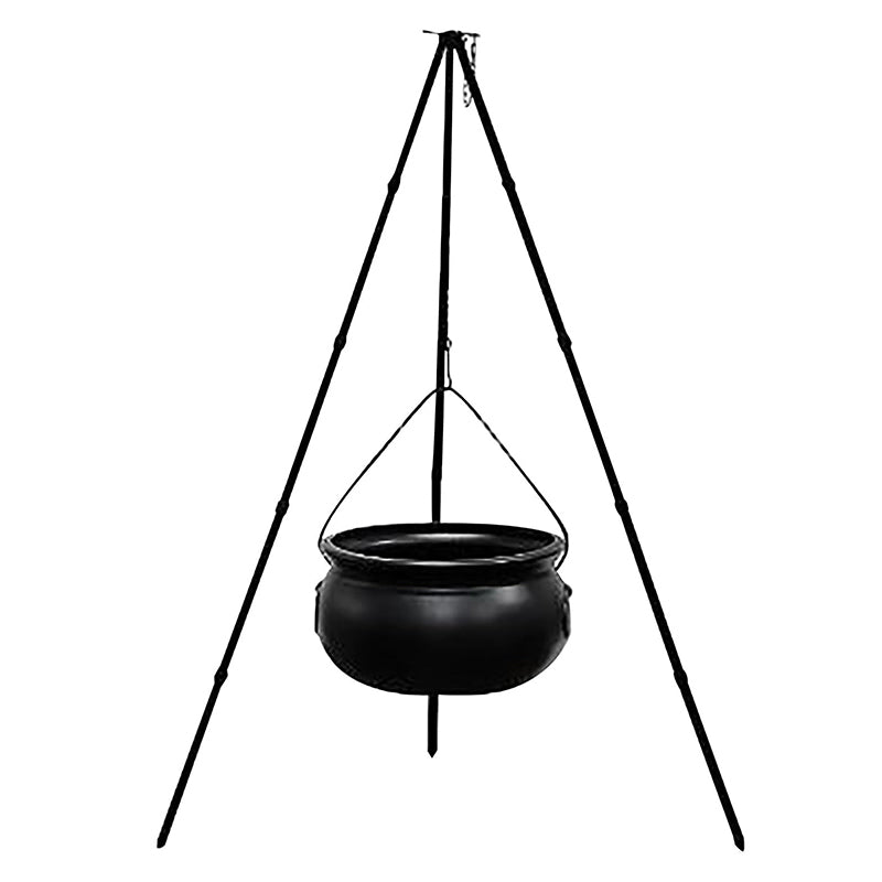 Black Halloween witches' cauldron with skeletons on tripod, outdoor horror house decoration for spooky Halloween displays.