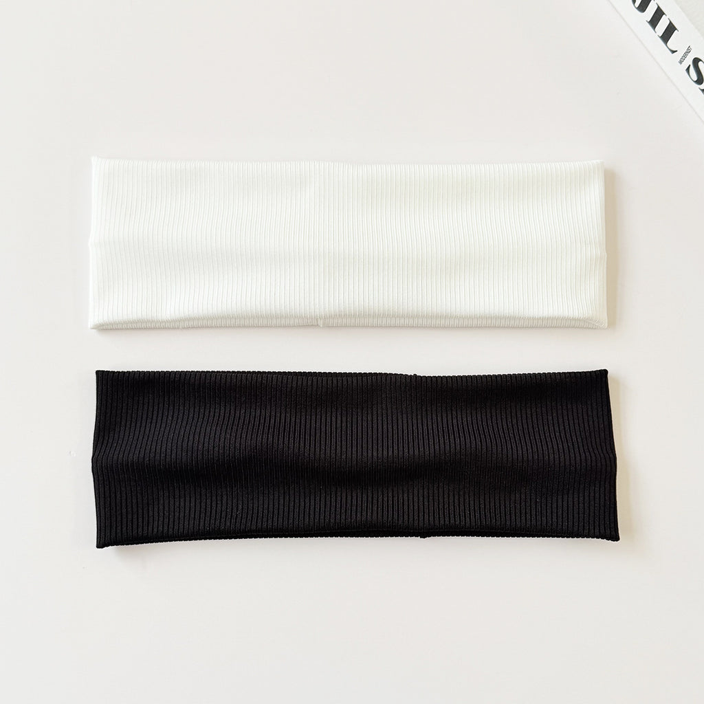 Black cotton elastic headband by eprolo, wide and sweat-absorbent, versatile solid color headwear for active or casual use.
