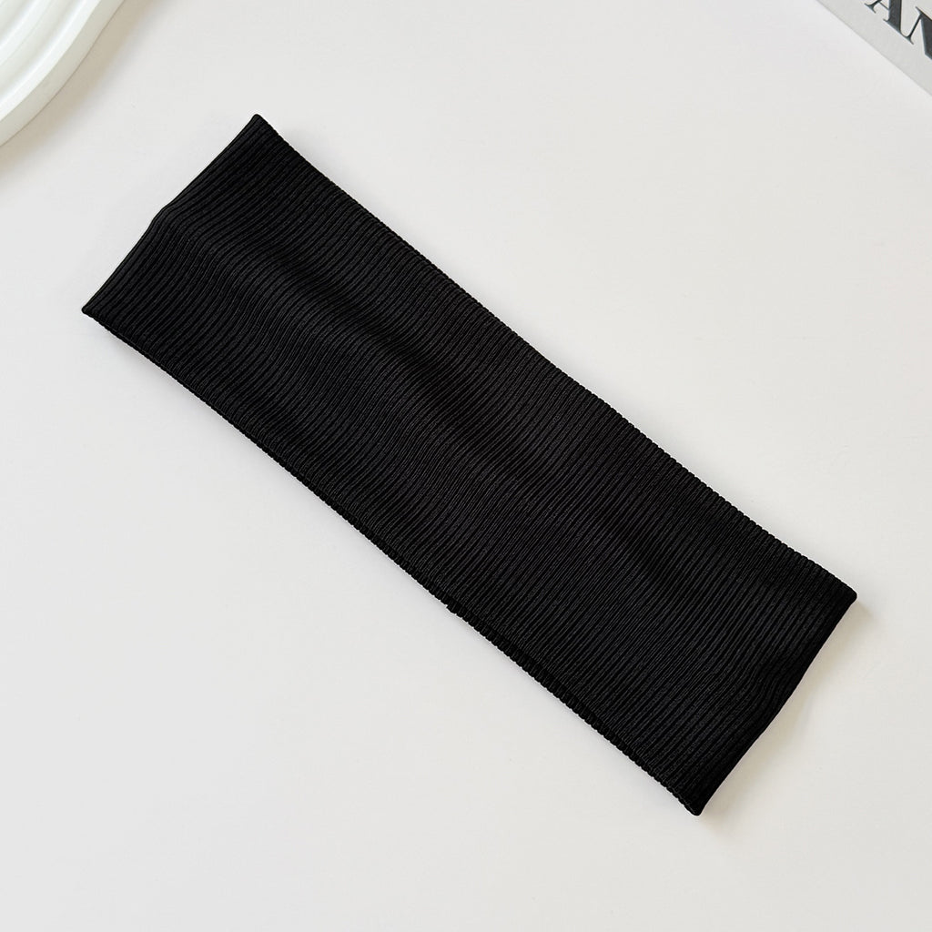 Black cotton elastic headband from eprolo, wide sweat-absorbent band, versatile solid color headwear for active and casual wear.