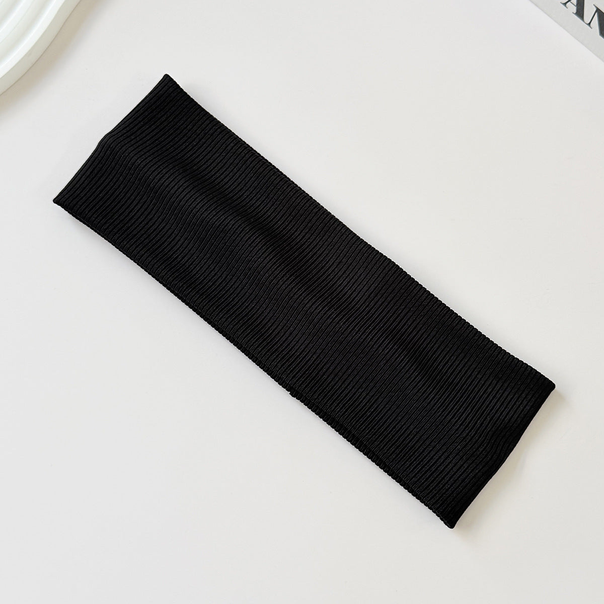 Black cotton elastic headband from eprolo, wide sweat-absorbent band, versatile solid color headwear for active and casual wear.