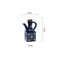 Blue ceramic oil and vinegar cruet set with cork stoppers, kitchen seasoning bottles by eprolo for storing oils and vinegars.