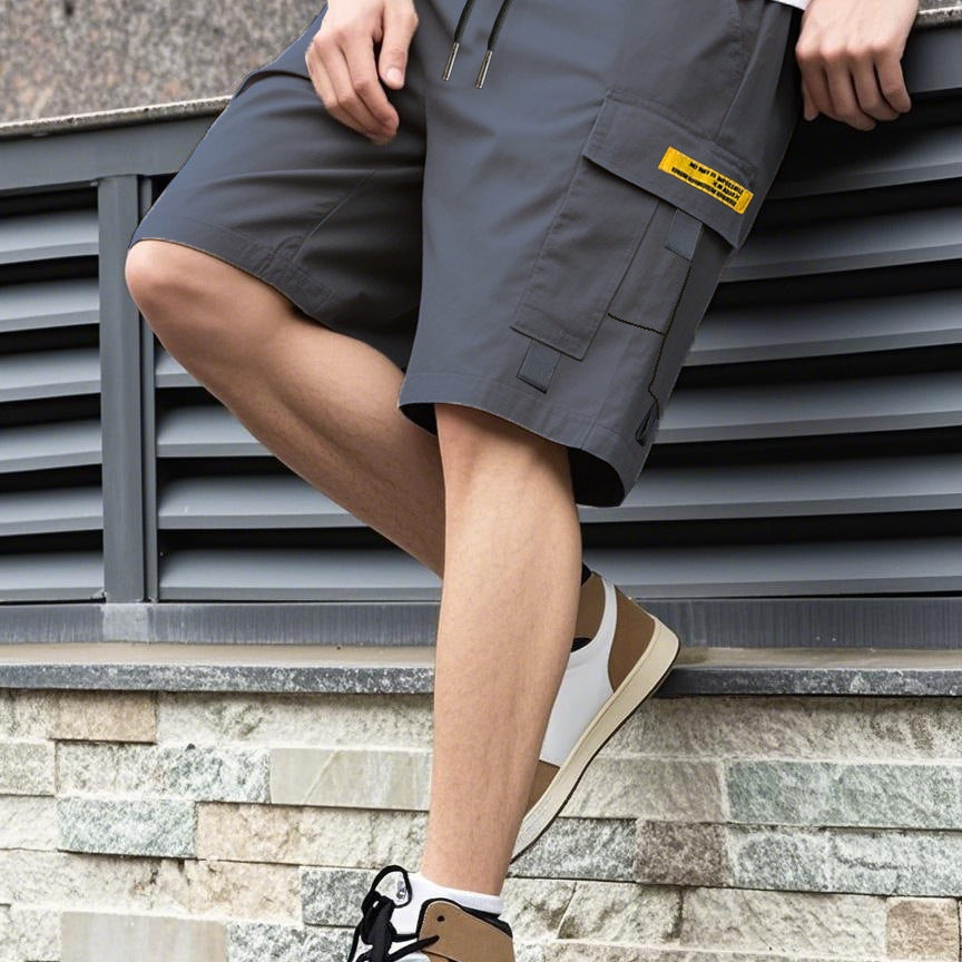 Gray men's casual trendy shorts by eprolo with loose fit, drawstring waist, ideal for students and casual wear.
