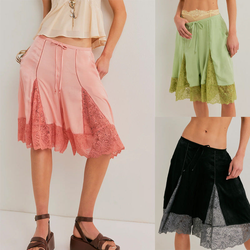 Pink women's lightweight satin pants with lace trim, mid-length style from eprolo, showcasing smooth fabric and elegant design.