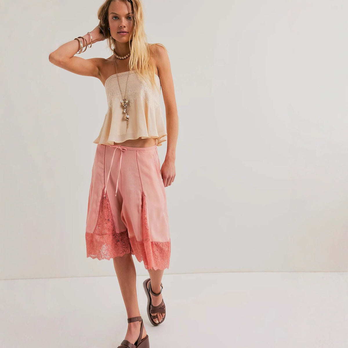 Women's lightweight satin lace mid-length pants with sexy trim by eprolo, pink color and stylish design.
