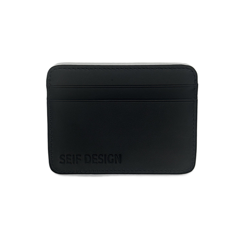 Black handmade leather card holder by Seif Design with multiple card slots and a sleek, minimalist design.