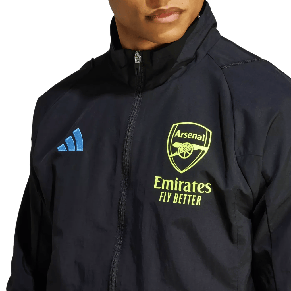Black Arsenal FC presentation soccer tracksuit for adults, Adidas 2023/24, featuring the team logo and sporty design.