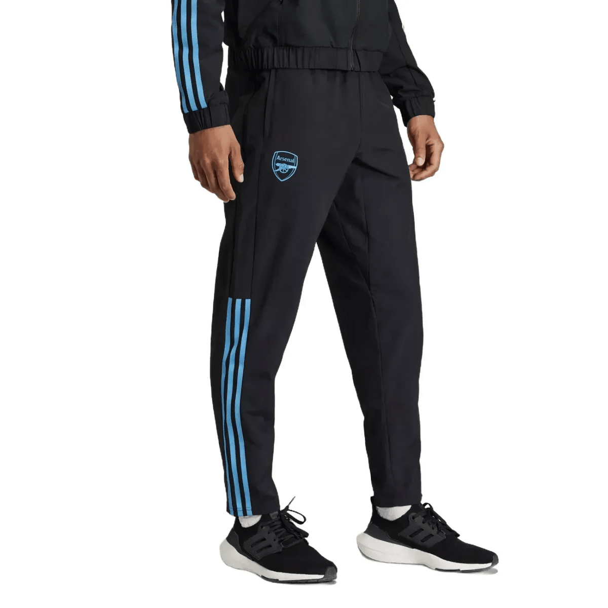 Black Arsenal FC presentation soccer tracksuit for adults, Adidas 2023/24, featuring team logo and athletic design.
