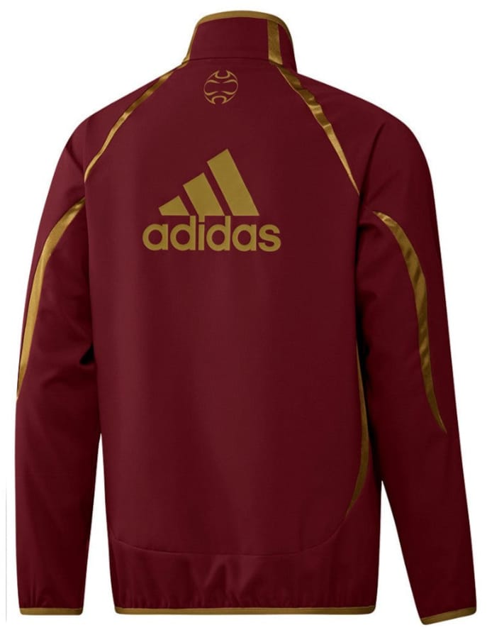 Arsenal retro woven presentation tracksuit for men by Adidas, featuring the classic design and team logo on the tracksuit.