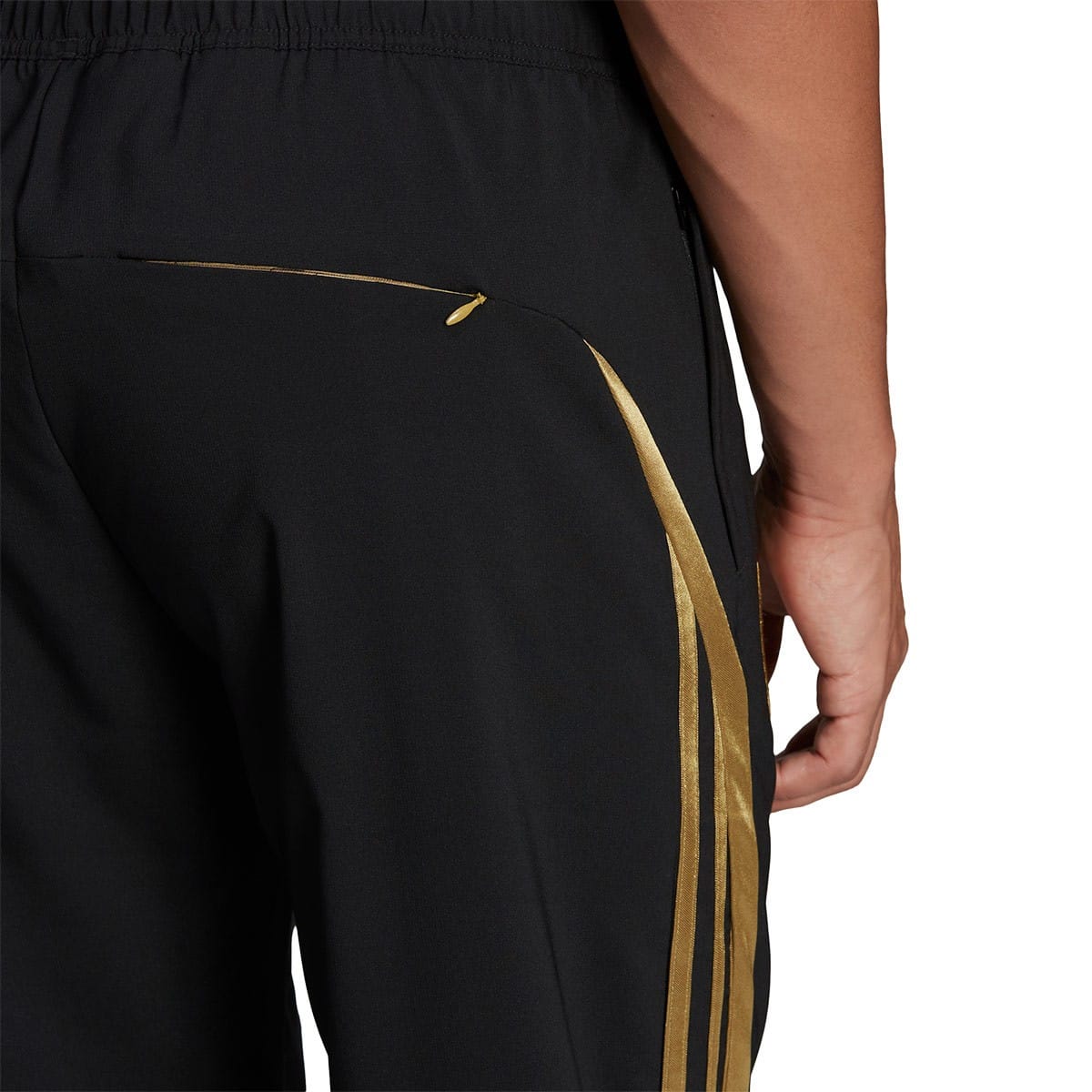 Arsenal retro woven presentation tracksuit for men by Adidas, featuring classic design and detailed fabric close-up.